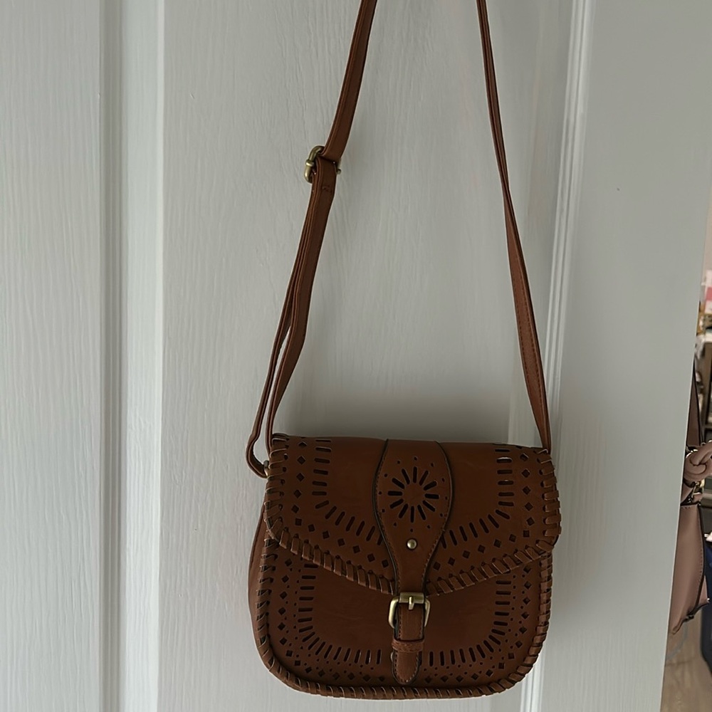 Perforated Cross Shoulder bag .